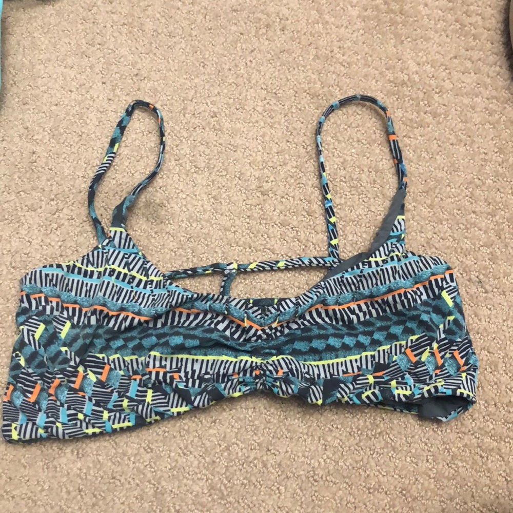 San Lorenzo reversible caged swimsuit top.